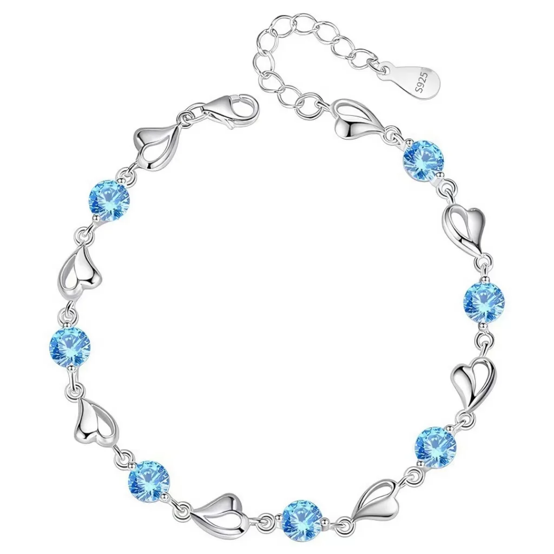 Elegant Silver Heart Charm Bracelet with Sparkling Blue Crystals