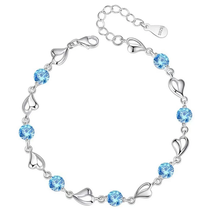 Elegant Silver Heart Charm Bracelet with Sparkling Blue Crystals